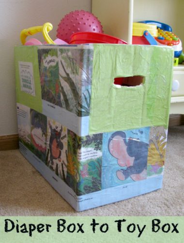 What a fun easy craft to reuse empty diaper boxes! It's such a cute toy bin!