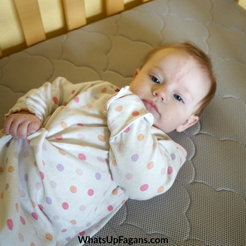 Got a Baby Rolling Over In Her Sleep? Here's What to Do