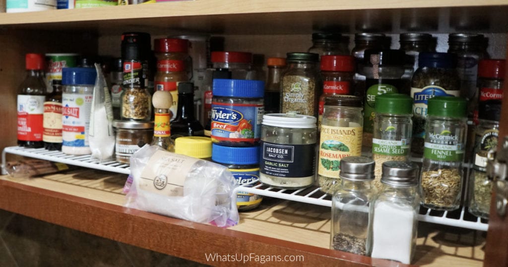how to organize spices in a kitchen cabinet