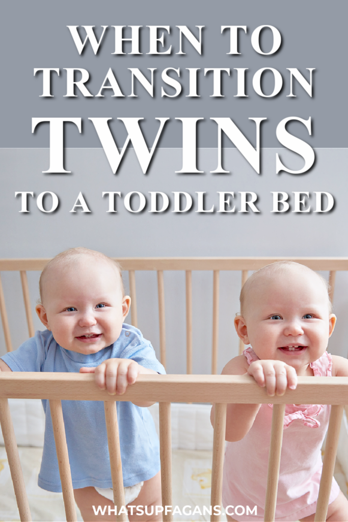 when to transition twins to toddler beds - cute picture of boy girl twins standing up in their crib. 